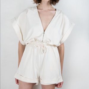 The Frankie Shop zip front ivory romper with hood